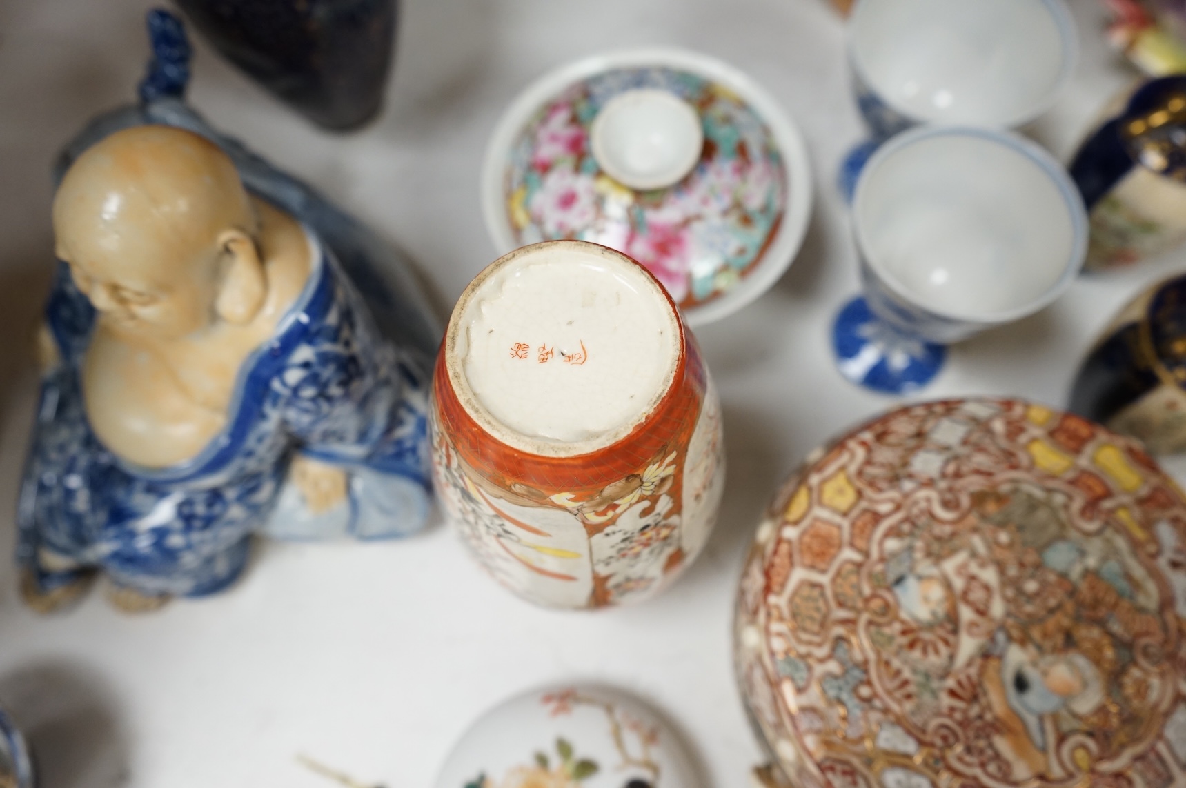 A collection of mostly Chinese and Japanese ceramics to include famille rose, satsuma, kutani etc. tallest 45cm